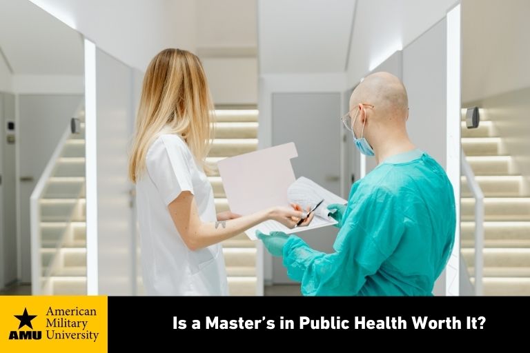 public health workers looking at medical chart