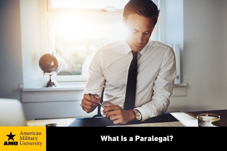 paralegal working at desk